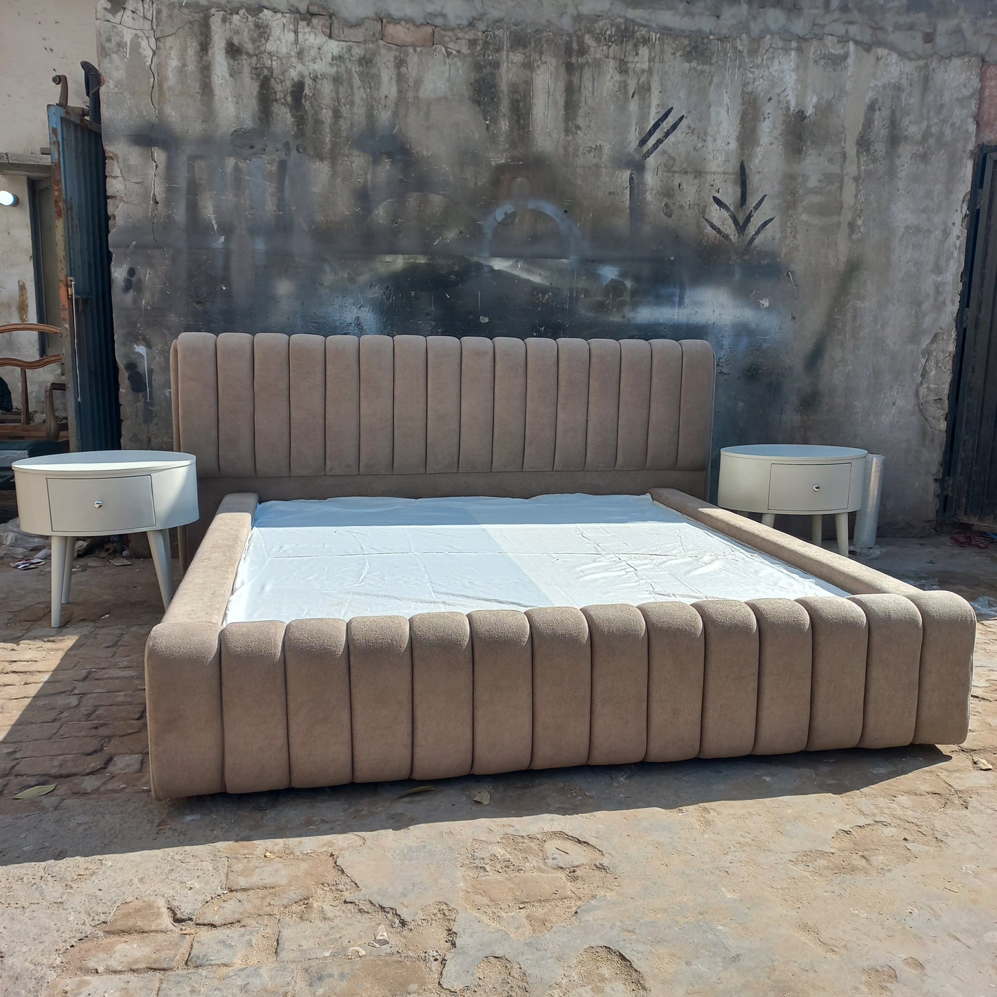 Lining bed with side tables and storage