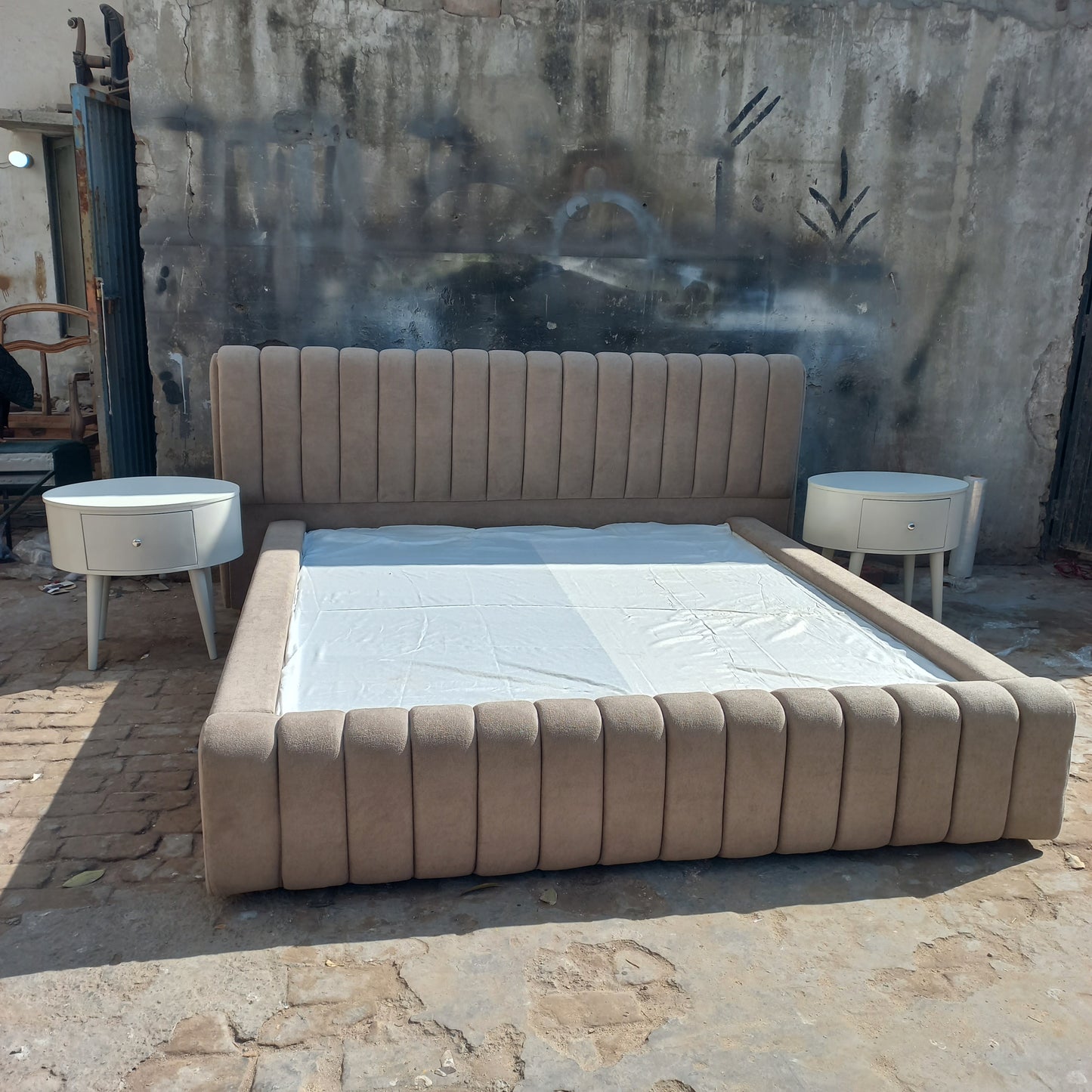 Lining bed with side tables and storage