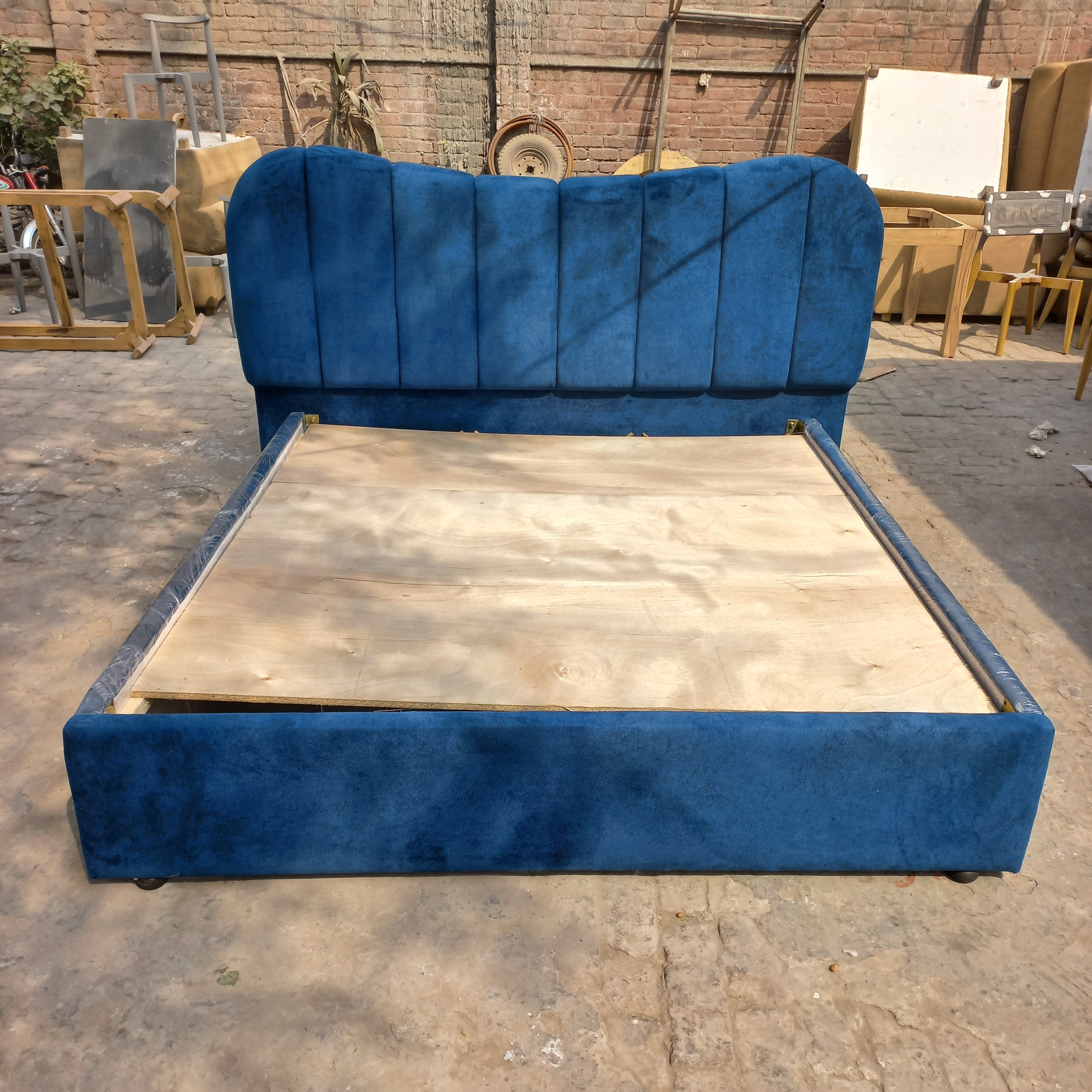 Harpy bed in bluey boucle fabric
