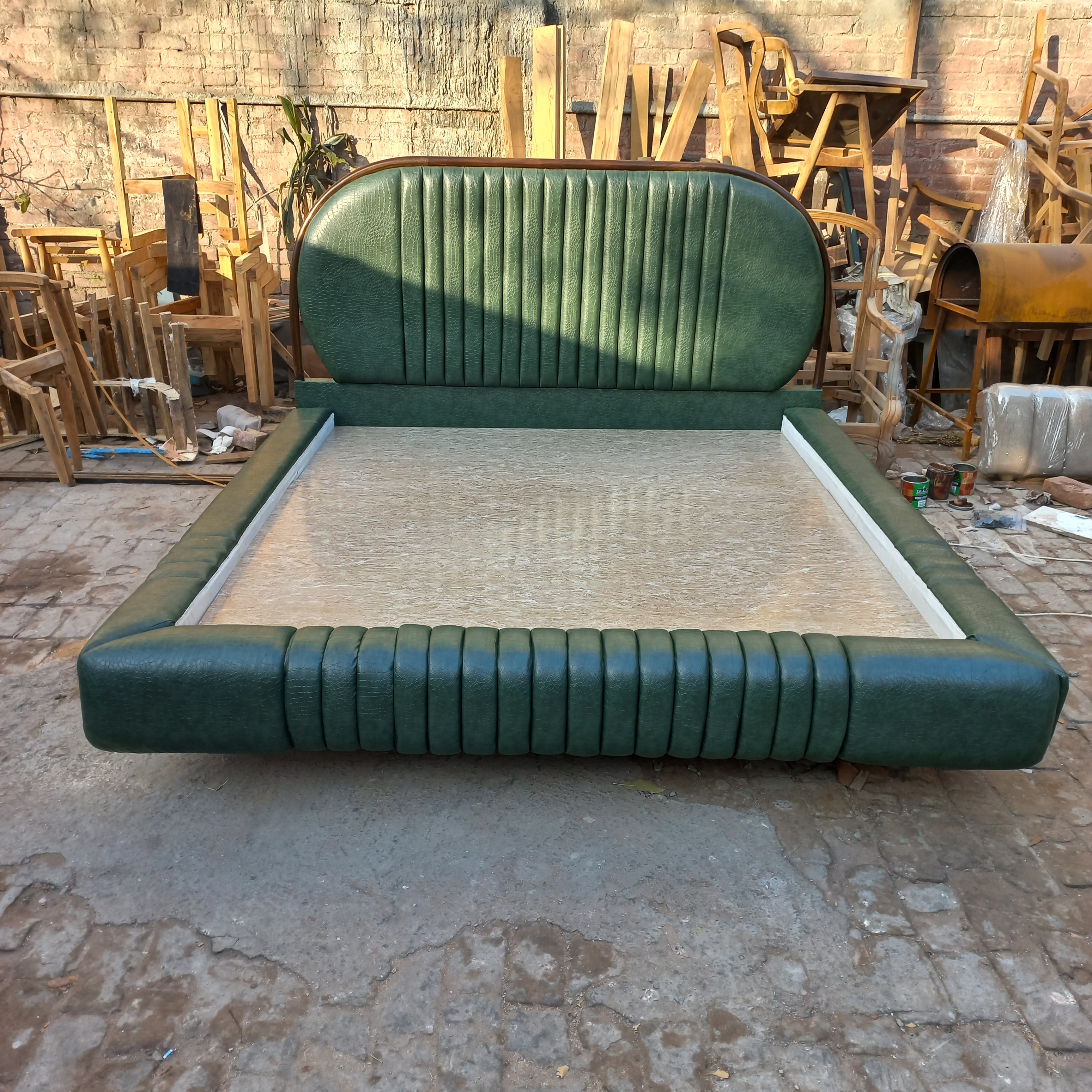 Olivia bed with green leather and wood combination