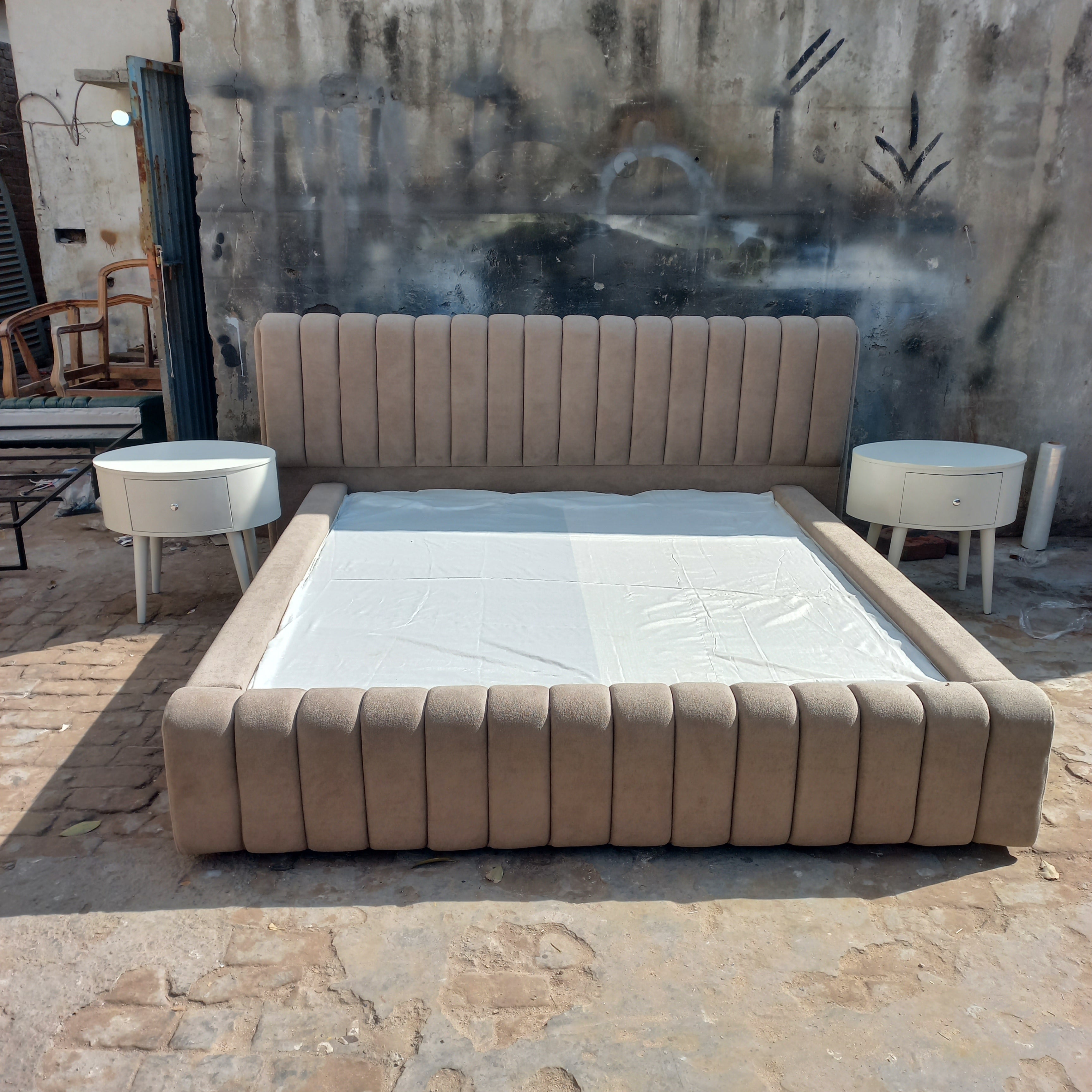 Lining bed with side tables and storage