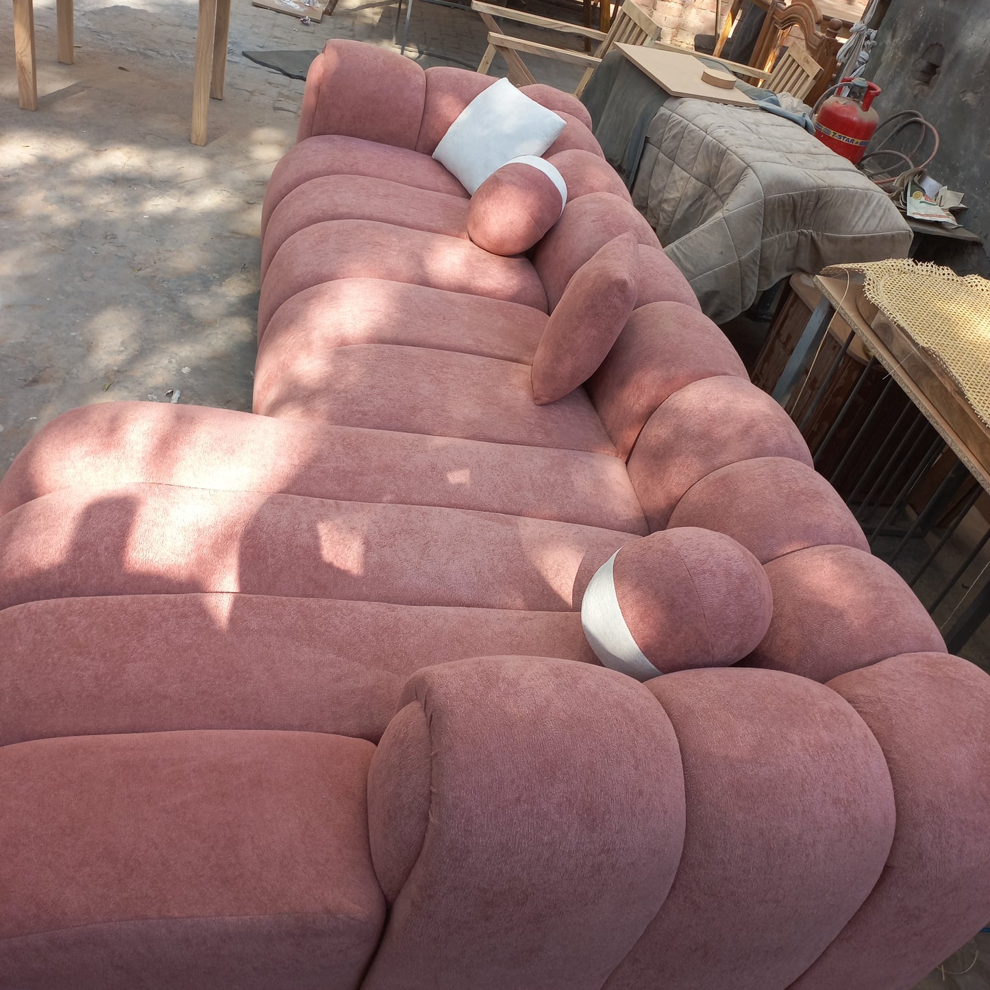 Our bulky pink sofa set